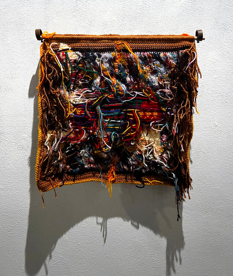 under the rug (backside)